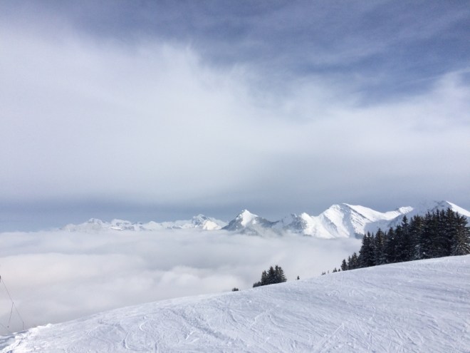 Clouds above the mountains in the French Alps